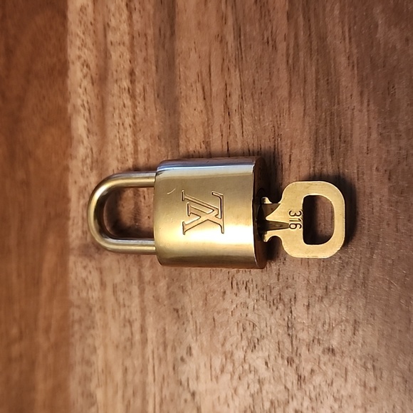 Louis Vuitton Accessories Louis Vuitton Lock And Key 36 Poshmark
